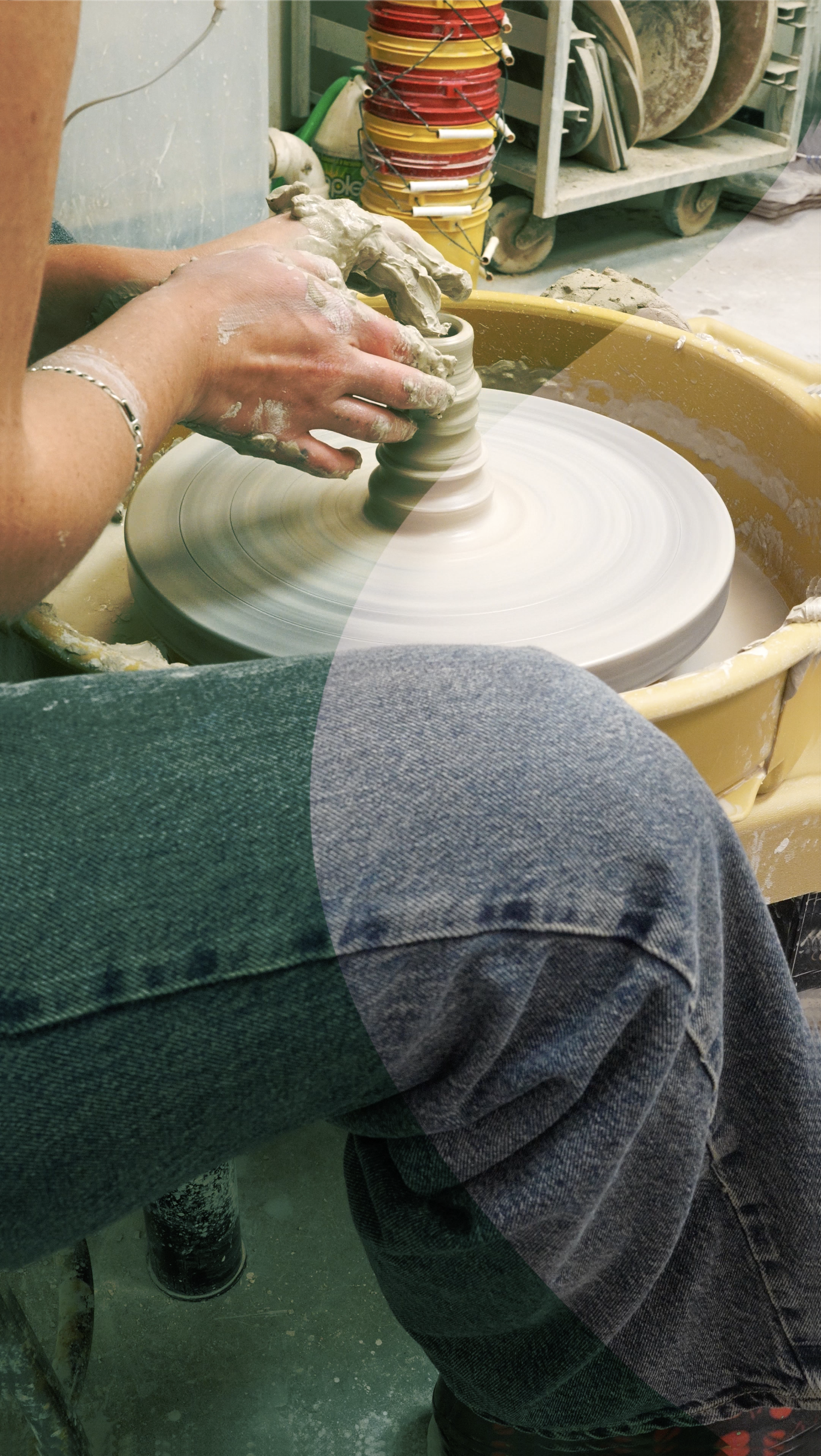 Image of woman throwing a pot