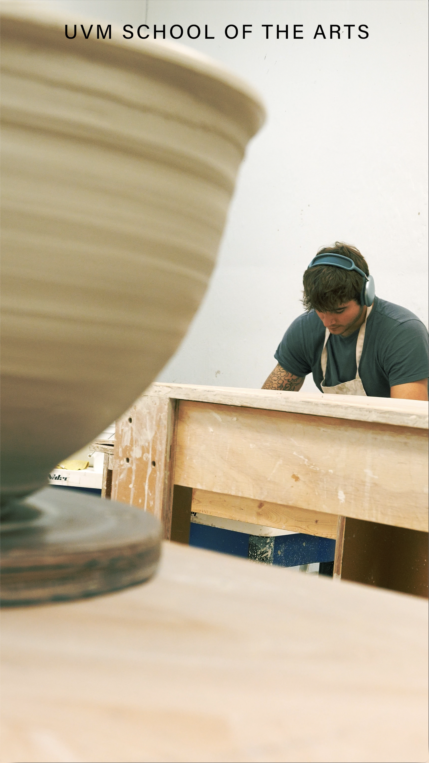 Image of man throwing a pot